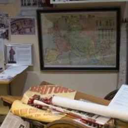 a group of people sitting at a desk