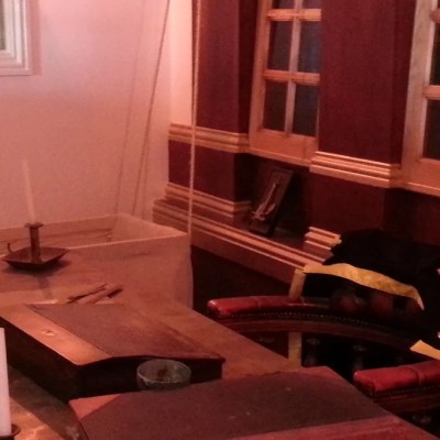 a chair sitting in front of a window