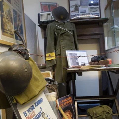 a person sitting at a desk in an office