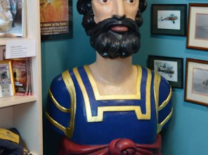 a boy in a blue shirt