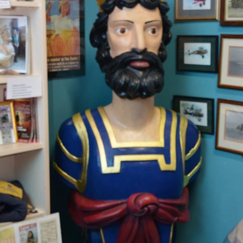 a boy in a blue shirt