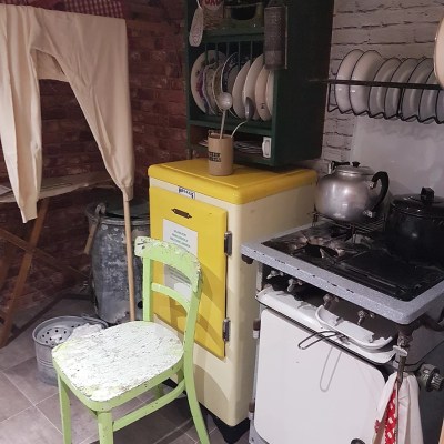 a stove top oven sitting inside of a room