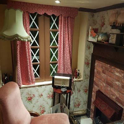 a fire place sitting in a living room