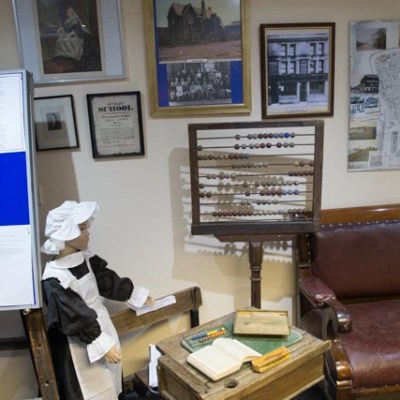 a living room filled with furniture and a fireplace