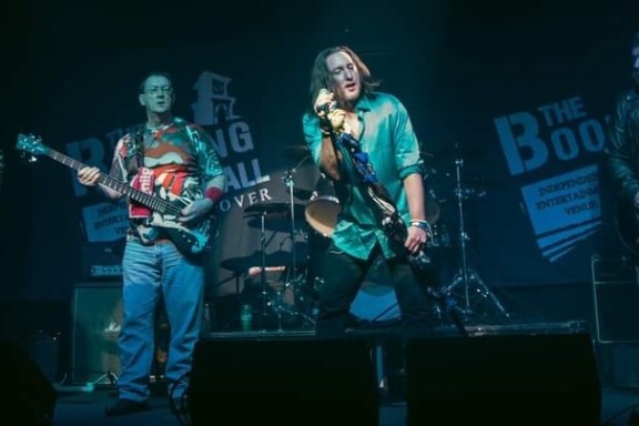 a person standing on a stage