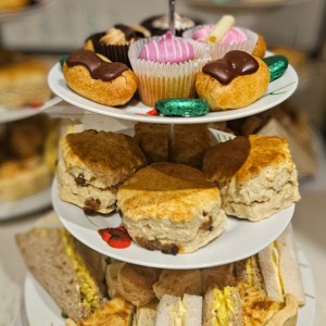 a table topped with plates of food on a plate